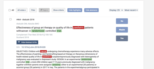 Covidence title and abstract screening interface showing screening records and decision controls.